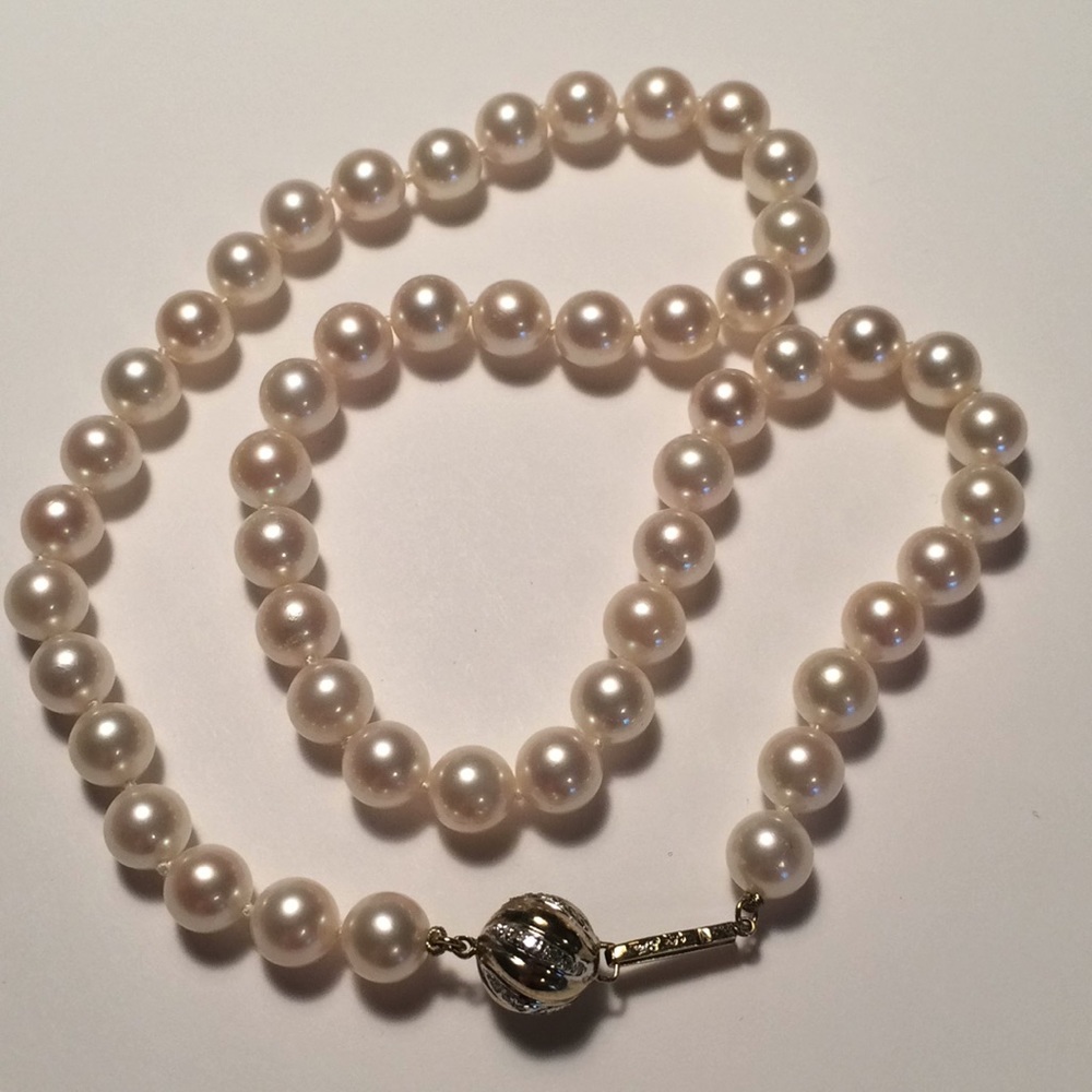 14 karat gold strand of pearls